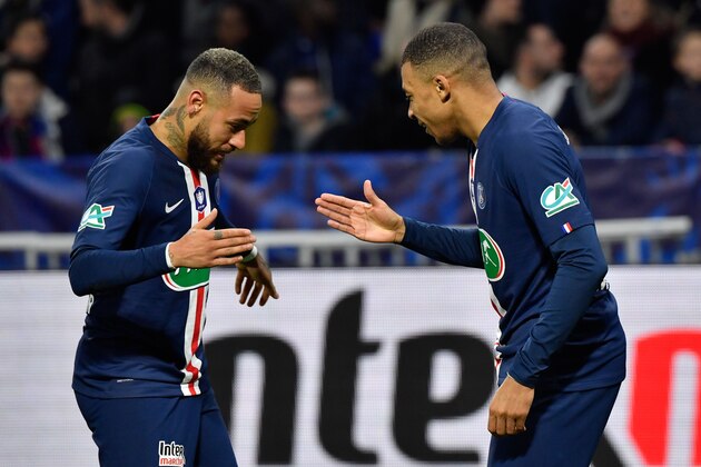 Paris Saint-Germain's French forward Kylian Mbappe (R) is congratulated by Paris Saint-Germain's Brazilian forward Neymar after scoring a goal during the French Cup semi-final football match between Olympique Lyonnais (OL) and Paris Saint-Germain (PSG) at the Groupama Stadium in Decines-Charpieu, centraleastern France, on March 4, 2020. (Photo by Philippe DESMAZES / AFP) (Photo by PHILIPPE DESMAZES/AFP via Getty Images)