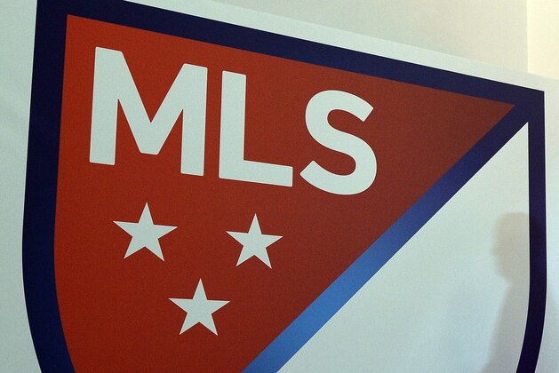 The new Major League Soccer (MLS) logo is pictured during an unveiling event in New York on September 18, 2014. MLS unveiled the new logo ahead of its 20th season. AFP PHOTO/Jewel Samad        (Photo credit should read JEWEL SAMAD/AFP via Getty Images)