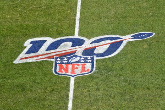 KANSAS CITY, MISSOURI - JANUARY 19: The NFL 100 year anniversary logo is seen on the field before the AFC Championship Game between the Kansas City Chiefs and the Tennessee Titans at Arrowhead Stadium on January 19, 2020 in Kansas City, Missouri. (Photo by Peter Aiken/Getty Images)