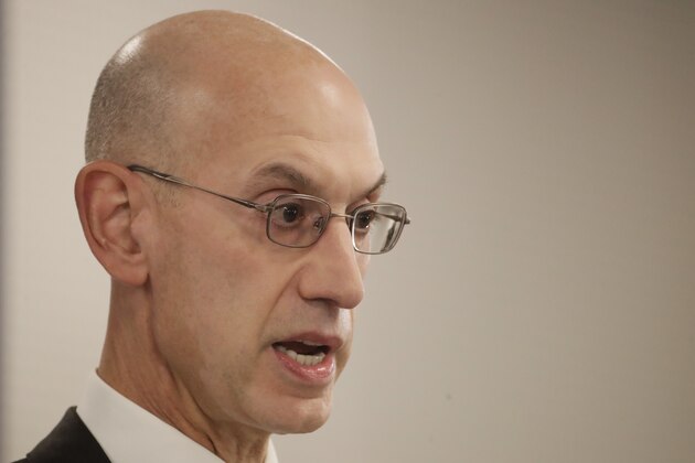NBA Commissioner Adam Silver speaks at a news conference before an NBA preseason basketball game between the Houston Rockets and the Toronto Raptors Tuesday, Oct. 8, 2019, in Saitama, near Tokyo. (AP Photo/Jae C. Hong)