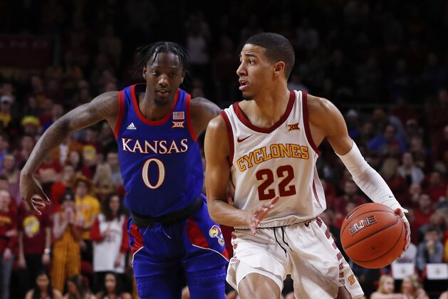 AMES, IA - JANUARY 8: Tyrese Haliburton #22 of the Iowa State Cyclones drives the ball as Marcus Garrett #0 of the Kansas Jayhawks defends in the first half of the game at Hilton Coliseum on January 8, 2020 in Ames, Iowa. The Kansas Jayhawks won 79-53 over the Iowa State Cyclones. (Photo by David K Purdy/Getty Images)