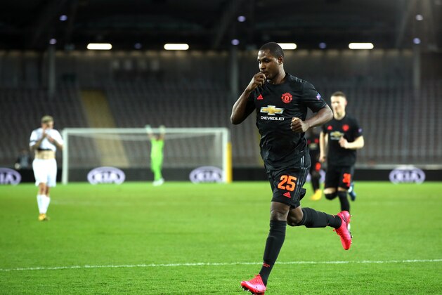 LINZ, AUSTRIA - MARCH 12: (FREE FOR EDITORIAL USE) In this handout image provided by UEFA, Odion Ighalo of Manchester United celebrates after scoring his team's first goal during the UEFA Europa League round of 16 first leg match between LASK and Manchester United at Linzer Stadion on March 12, 2020 in Linz, Austria. The match is played behind closed doors as a precaution against the spread of COVID-19 (Coronavirus).  (Photo by UEFA - Handout/UEFA via Getty Images )