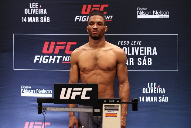 BRASILIA, BRAZIL - MARCH 13: Kevin Lee of the United States poses on the scale during the UFC Fight Night Lee v Oliveira weigh-in at Windsor Plaza Hotel on March 13, 2020 in Brasilia, Brazil. (Photo by Buda Mendes/Zuffa LLC)