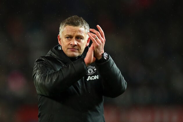 MANCHESTER, ENGLAND - MARCH 08: Ole Gunnar Solskjaer the head coach / manager of Manchester United applauds the fans at full time during the Premier League match between Manchester United and Manchester City at Old Trafford on March 8, 2020 in Manchester, United Kingdom. (Photo by Robbie Jay Barratt - AMA/Getty Images)