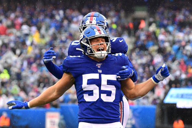 EAST RUTHERFORD, NEW JERSEY - OCTOBER 20: David Mayo #55 and Antonio Hamilton #30 of the New York Giants celebrate a touchdown in the second quarter of their game against the Arizona Cardinals at MetLife Stadium on October 20, 2019 in East Rutherford, New Jersey. (Photo by Emilee Chinn/Getty Images)