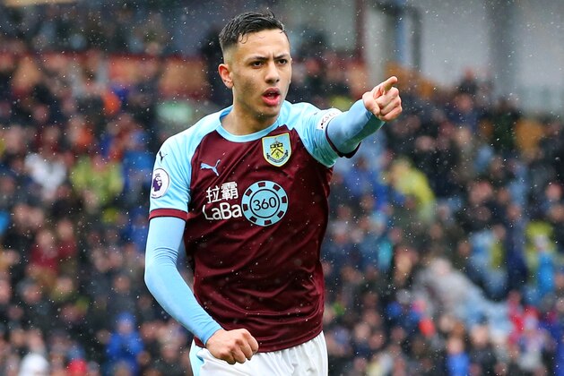 BURNLEY, ENGLAND - MARCH 16: Dwight McNeil of Burnley celebrates after scoring his team's first goal during the Premier League match between Burnley FC and Leicester City at Turf Moor on March 16, 2019 in Burnley, United Kingdom. (Photo by Alex Livesey/Getty Images)