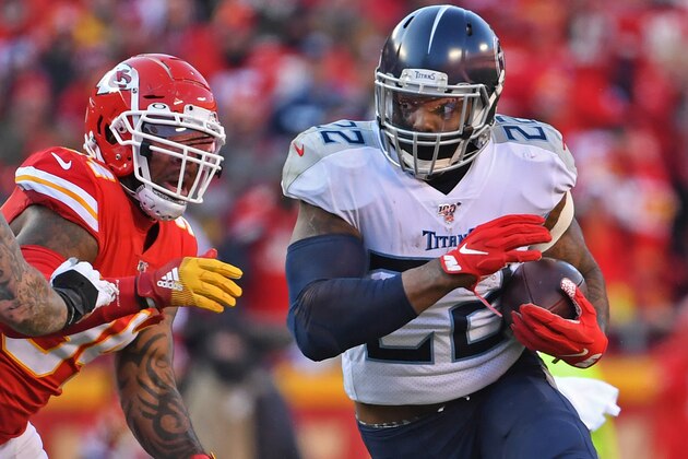 KANSAS CITY, MO - JANUARY 19:  Running back Derrick Henry #22 of the Tennessee Titans runs up field against the Kansas City Chiefs in the first half in the AFC Championship Game at Arrowhead Stadium on January 19, 2020 in Kansas City, Missouri. (Photo by Peter G. Aiken/Getty Images)