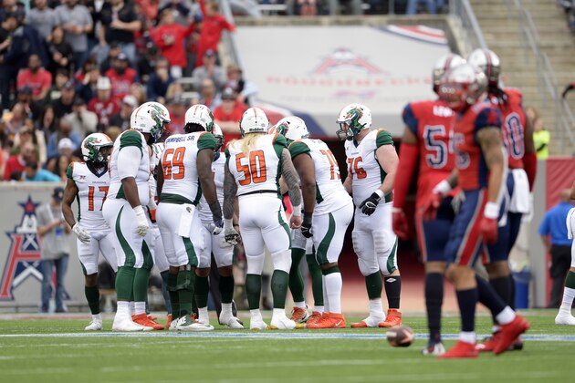 HOUSTON, TX - MARCH 7: The Seattle Dragons huddle during the XFL game against the Houston Roughnecks at TDECU Stadium on March 7, 2020 in Houston, Texas. (Photo by Thomas Campbell/XFL via Getty Images)