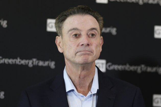 FILE - In this Feb. 21, 2018 file photo, former Louisville basketball coach Rick Pitino appears during a news conference in New York.  Diversion Books announced Monday, July 30 that Pitino has a memoir coming in September 4.