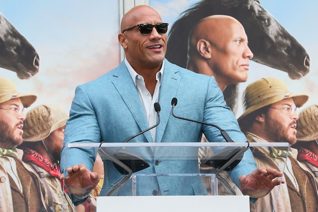 HOLLYWOOD, CALIFORNIA - DECEMBER 10: Dwayne Johnson attends a Hand and Footprint ceremony honoring Kevin Hart at the TCL Chinese Theatre IMAX on December 10, 2019 in Hollywood, California. (Photo by Jean Baptiste Lacroix/Getty Images)