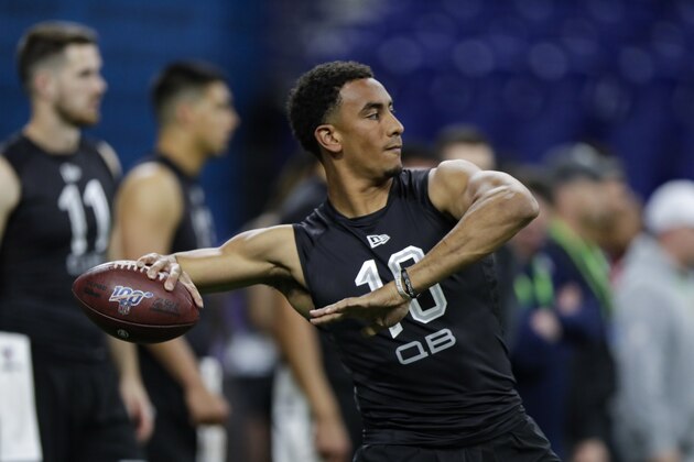 Utah State quarterback Jordan Love runs a drill at the NFL football scouting combine in Indianapolis, Thursday, Feb. 27, 2020. (AP Photo/Michael Conroy)
