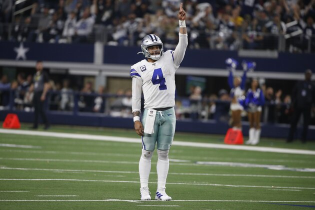 Dallas Cowboys quarterback Dak Prescott (4) celebrates a touchdown against the Washington Redskins during the second half of an NFL football game in Arlington, Texas, Sunday, Dec. 15, 2019. (AP Photo/Ron Jenkins)