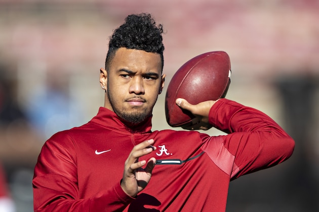 FAYETTEVILLE, AR - NOVEMBER 9:   Tua Tagovailoa #13 of the Alabama Crimson Tide warms up before a game against the Mississippi State Bulldogs at Davis Wade Stadium on November 16, 2019 in Starkville, Mississippi.  The Crimson Tide defeated the Bulldogs 38-7.  (Photo by Wesley Hitt/Getty Images)