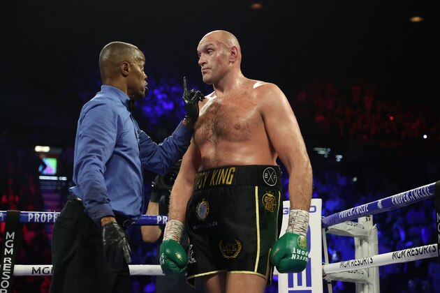 LAS VEGAS, NEVADA - FEBRUARY 22:    Referee Kenny Bayless deducts a point from Tyson Fury during their Heavyweight bout for Deontay Wilder's WBC and Fury's lineal heavyweight title on February 22, 2020 at MGM Grand Garden Arena in Las Vegas, Nevada. (Photo by Al Bello/Getty Images)