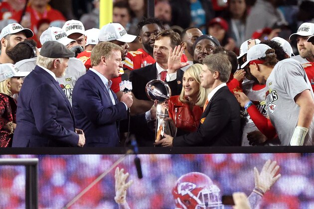 MIAMI, FLORIDA - FEBRUARY 02: NFL commissioner Roger Goodell presents Kansas City Chiefs owner and CEO Clark Hunt with the Vince Lombardi Trophy after they defeated the San Francisco 49ers 31-20 in Super Bowl LIV at Hard Rock Stadium on February 02, 2020 in Miami, Florida. (Photo by Al Bello/Getty Images)