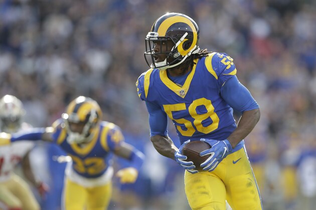Los Angeles Rams inside linebacker Cory Littleton scores on a interception against the San Francisco 49ers during the first half in an NFL football game Sunday, Dec. 30, 2018, in Los Angeles. (AP Photo/Marcio Jose Sanchez)