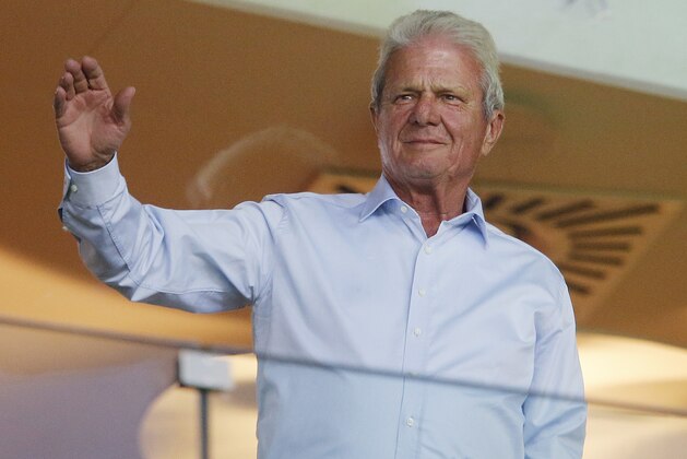 Hoffenheim's main sponsor Dietmar Hopp gestures prior to a Champions League's qualifier first leg soccer match between 1899 Hoffenheim and FC Liverpool, in the Rhein-Neckar-Arena, in Sinsheim, Germany, Tuesday, Aug. 15, 2017. (AP Photo/Michael Probst)