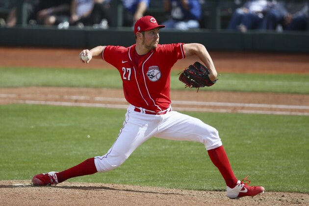 Cincinnati Reds pitcher Trevor Bauer throws against the Los Angeles Dodgers during the fourth inning of a spring training baseball game Monday, March 2, 2020, in Goodyear, Ariz. (AP Photo/Ross D. Franklin)