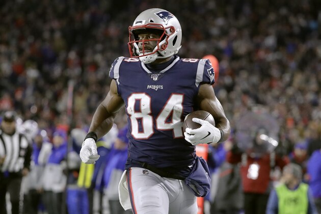 New England Patriots tight end Benjamin Watson runs after catching a pass in the second half of an NFL football game against the Buffalo Bills, Saturday, Dec. 21, 2019, in Foxborough, Mass. The play was nullified by a penalty. (AP Photo/Steven Senne)