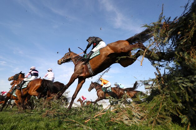 LIVERPOOL, ENGLAND - APRIL 06:  Derek Fox riding One For Arthur clears the Canal Turn during the Randox Health Grand National Handicap Chase at Aintree Racecourse on April 06, 2019 in Liverpool, England. (Photo by Michael Steele/Getty Images)