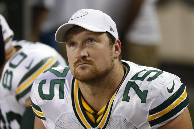 In this Sept. 5, 2019 photo Green Bay Packers offensive tackle Bryan Bulaga sits on the bench during an NFL football game against the Chicago Bears in Chicago. Packers coach Matt LaFleur isn’t ready yet to rule out starting right tackle Bryan Bulaga for Sunday’s game at the New York Giants. LaFleur said Wednesday, Nov. 27, 2019 that he would take the week to figure out the best combination of starting five for the offensive line. LaFleur said Bulaga, who left in the first quarter of Sunday night’s 37-8 loss in San Francisco with a knee injury, could still be a part of the equation up front. (AP Photo/Charles Rex Arbogast)