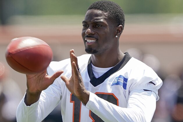 Cincinnati Bengal wide receiver A.J. Green (18) catches a pass during the first day of NFL football training camp Saturday, July 27, 2019, in Dayton, Ohio. (AP Photo/Bryan Woolston)