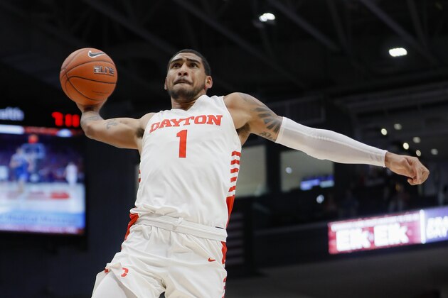 Dayton's Obi Toppin dunks during the first half of an NCAA college basketball game against Drake, Saturday, Dec. 14, 2019, in Dayton, Ohio. (AP Photo/John Minchillo)
