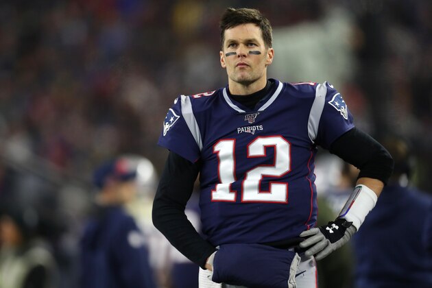 FOXBOROUGH, MASSACHUSETTS - JANUARY 04: Tom Brady #12 of the New England Patriots looks on from the sideline during the the AFC Wild Card Playoff game against the Tennessee Titans at Gillette Stadium on January 04, 2020 in Foxborough, Massachusetts. (Photo by Maddie Meyer/Getty Images) FOXBOROUGH, MASSACHUSETTS - JANUARY 04: Tom Brady #12 of the New England Patriots looks on from the sideline during the the AFC Wild Card Playoff game against the Tennessee Titans at Gillette Stadium on January 04, 2020 in Foxborough, Massachusetts. (Photo by Maddie Meyer/Getty Images)