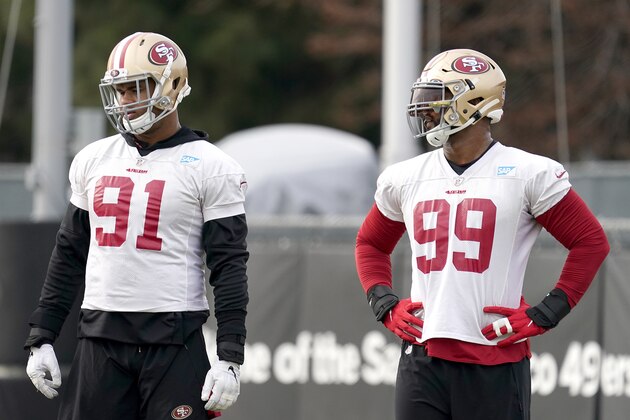 San Francisco 49ers defensive end Arik Armstead (91) and defensive tackle DeForest Buckner (99) watches during drills at the NFL football team's training facility in Santa Clara, Calif., Wednesday, Jan. 15, 2020. The 49ers will host the Green Bay Packers for the NFC Championship on Sunday. (AP Photo/Tony Avelar) San Francisco 49ers defensive end Arik Armstead (91) and defensive tackle DeForest Buckner (99) watches during drills at the NFL football team's training facility in Santa Clara, Calif., Wednesday, Jan. 15, 2020. The 49ers will host the Green Bay Packers for the NFC Championship on Sunday. (AP Photo/Tony Avelar)