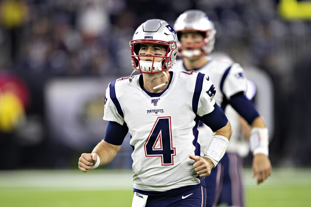 HOUSTON, TX - DECEMBER 1:  Jarrett Stidham #4 of the New England Patriots jogs onto the field before a game against the Houston Texans at NRG Stadium on December 1, 2019 in Houston, Texas.  The Texans defeated the Patriots 28-22.  (Photo by Wesley Hitt/Getty Images)