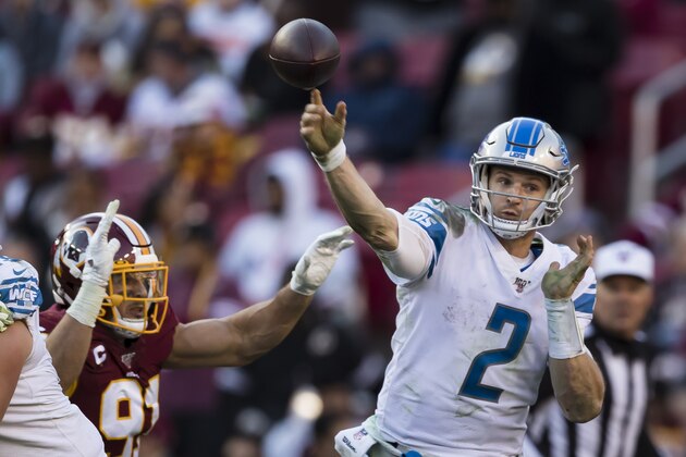 LANDOVER, MD - NOVEMBER 24: Jeff Driskel #2 of the Detroit Lions attempts a pass as Ryan Kerrigan #91 of the Washington Redskins defends during the second half at FedExField on November 24, 2019 in Landover, Maryland. (Photo by Scott Taetsch/Getty Images)