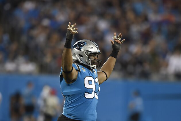 Carolina Panthers defensive tackle Gerald McCoy (93) reacts following a play against the Tampa Bay Buccaneers during the first half of an NFL football game in Charlotte, N.C., Thursday, Sept. 12, 2019. (AP Photo/Mike McCarn)