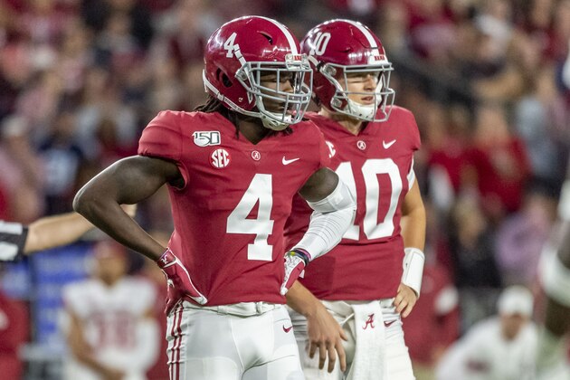 Alabama wide receiver Jerry Jeudy (4) and Alabama quarterback Mac Jones (10) look to the sidelines for a play against Arkansas during the first half of an NCAA college football game, Saturday, Oct. 26, 2019, in Tuscaloosa, Ala. (AP Photo/Vasha Hunt)