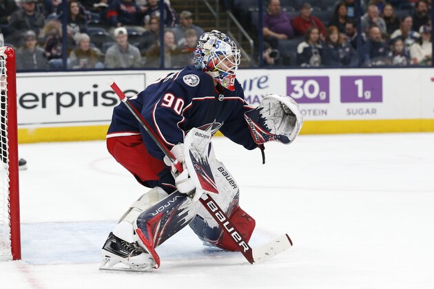 Columbus Blue Jackets' Elvis Merzlikins, of Latvia, plays against the Ottawa Senators during an NHL hockey game Monday, Feb. 24, 2020, in Columbus, Ohio. (AP Photo/Jay LaPrete)