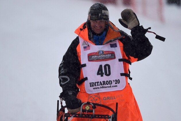 WILLOW, AK - MARCH 08: Thomas Waerner (Torpa, Norway) waves to spectators while driving his team during the restart of the 2020 Iditarod Sled Dog Race at Willow Lake on March 8, 2020 in Willow, Alaska. (Photo by Lance King/Getty Images)