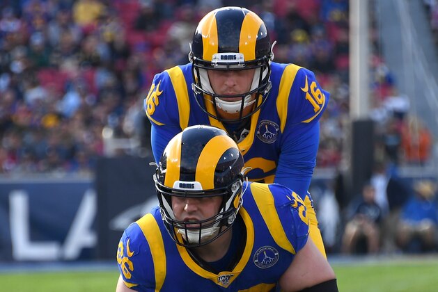LOS ANGELES, CA - DECEMBER 29: Quarterback Jared Goff #16 takes a snap from offensive guard Austin Blythe #66 of the Los Angeles Rams during the game against the Arizona Cardinals at the Los Angeles Memorial Coliseum on December 29, 2019 in Los Angeles, California. (Photo by Jayne Kamin-Oncea/Getty Images)