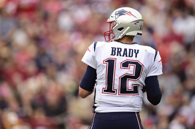 LANDOVER, MD - OCTOBER 06: Tom Brady #12 of the New England Patriots drops back to throw a pass in the first half against the Washington Redskins at FedExField on October 6, 2019 in Landover, Maryland. (Photo by Patrick McDermott/Getty Images)