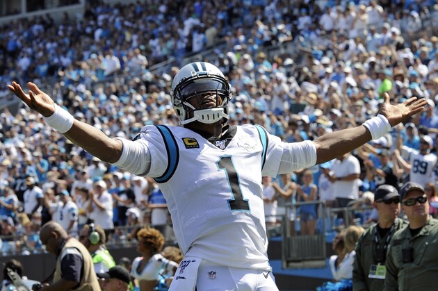 Carolina Panthers quarterback Cam Newton (1) reacts following running back Christian McCaffrey's touchdown against the Los Angeles Rams during the second half of an NFL football game in Charlotte, N.C., Sunday, Sept. 8, 2019. (AP Photo/Mike McCarn)