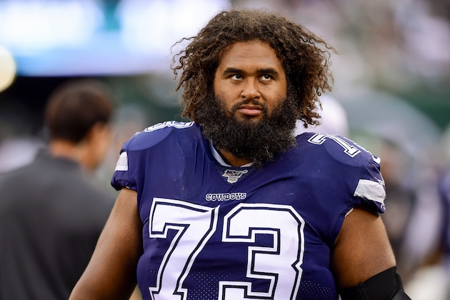 EAST RUTHERFORD, NEW JERSEY - OCTOBER 13:  Joe Looney #73 of the Dallas Cowboys looks on against the New York Jets at MetLife Stadium on October 13, 2019 in East Rutherford, New Jersey. (Photo by Steven Ryan/Getty Images)