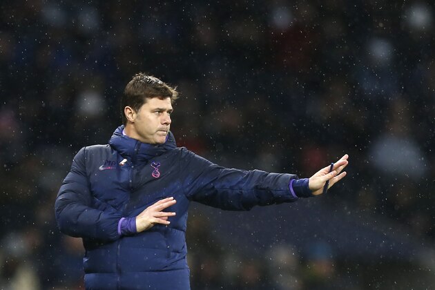Tottenham Hotspur's Argentinian head coach Mauricio Pochettino gestures during the English Premier League football match between Tottenham Hotspur and Sheffield United at Tottenham Hotspur Stadium in London, on November 9, 2019. (Photo by Ian KINGTON / AFP) / RESTRICTED TO EDITORIAL USE. No use with unauthorized audio, video, data, fixture lists, club/league logos or 'live' services. Online in-match use limited to 120 images. An additional 40 images may be used in extra time. No video emulation. Social media in-match use limited to 120 images. An additional 40 images may be used in extra time. No use in betting publications, games or single club/league/player publications. /  (Photo by IAN KINGTON/AFP via Getty Images)