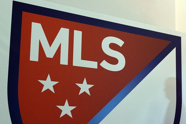 The new Major League Soccer (MLS) logo is pictured during an unveiling event in New York on September 18, 2014. MLS unveiled the new logo ahead of its 20th season. AFP PHOTO/Jewel Samad        (Photo credit should read JEWEL SAMAD/AFP via Getty Images)