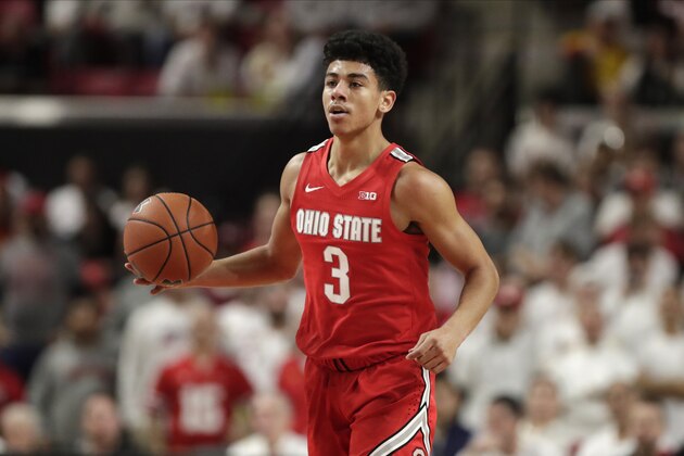 Ohio State guard D.J. Carton dribbles up court against Maryland during the first half of an NCAA college basketball game, Tuesday, Jan. 7, 2020, in College Park, Md. (AP Photo/Julio Cortez)