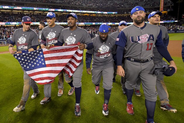 The U.S team celebrates an 8-0 win over Puerto Rico in the final of the World Baseball Classic in Los Angeles, Wednesday, March 22, 2017. (AP Photo/Mark J. Terrill)
