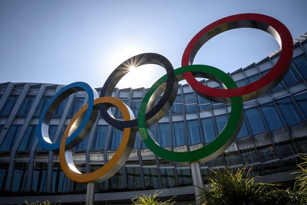 The Olympic Rings logo is pictured in front of the headquarters of the International Olympic Committee (IOC) in Lausanne on March 18, 2020, as doubts increase over whether Tokyo can safely host the summer Games amid the spread of the COVID-19. - Olympic chiefs acknowledged on March 18, 2020 there was no