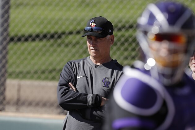 Colorado Rockies manager Bud Black watches during spring training baseball practice, Saturday, Feb. 15, 2020, in Scottsdale, Ariz. (AP Photo/Darron Cummings)