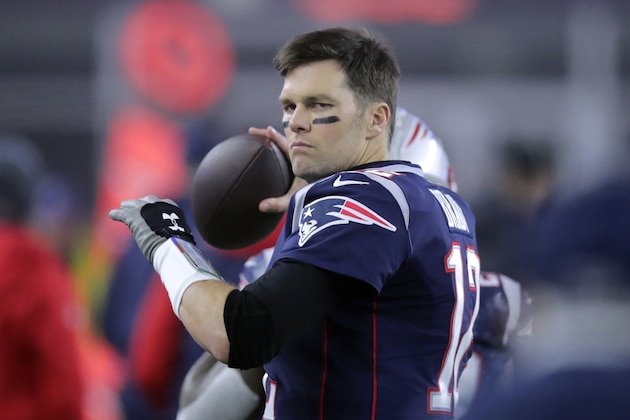New England Patriots quarterback Tom Brady tosses the football on the sideline in the first half of an NFL wild-card playoff football game against the Tennessee Titans, Saturday, Jan. 4, 2020, in Foxborough, Mass. (AP Photo/Charles Krupa) New England Patriots quarterback Tom Brady tosses the football on the sideline in the first half of an NFL wild-card playoff football game against the Tennessee Titans, Saturday, Jan. 4, 2020, in Foxborough, Mass. (AP Photo/Charles Krupa)