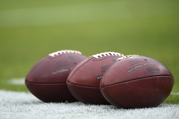 Footballs are seen on the field prior to an NFL football game between the Baltimore Ravens and the Houston Texans, Sunday, Nov. 17, 2019, in Baltimore. (AP Photo/Gail Burton)