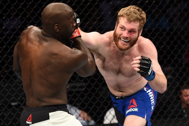LAS VEGAS, NV - JULY 07:  (R-L) Nick Roehrick punches Jared Cannonier in their light heavyweight bout during The Ultimate Fighter Finale at T-Mobile Arena on July 7, 2017 in Las Vegas, Nevada.  (Photo by Brandon Magnus/Zuffa LLC/Zuffa LLC via Getty Images)