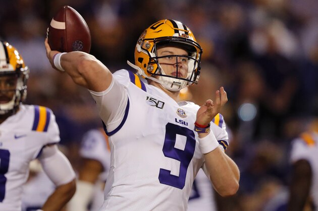 LSU quarterback Joe Burrow (9) warms up before an NCAA college football game against Texas A&M in Baton Rouge, La., Saturday, Nov. 30, 2019. (AP Photo/Gerald Herbert)