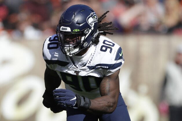 Seattle Seahawks outside linebacker Jadeveon Clowney (90) plays against the Cleveland Browns during the second half of an NFL football game, Sunday, Oct. 13, 2019, in Cleveland. (AP Photo/Ron Schwane)